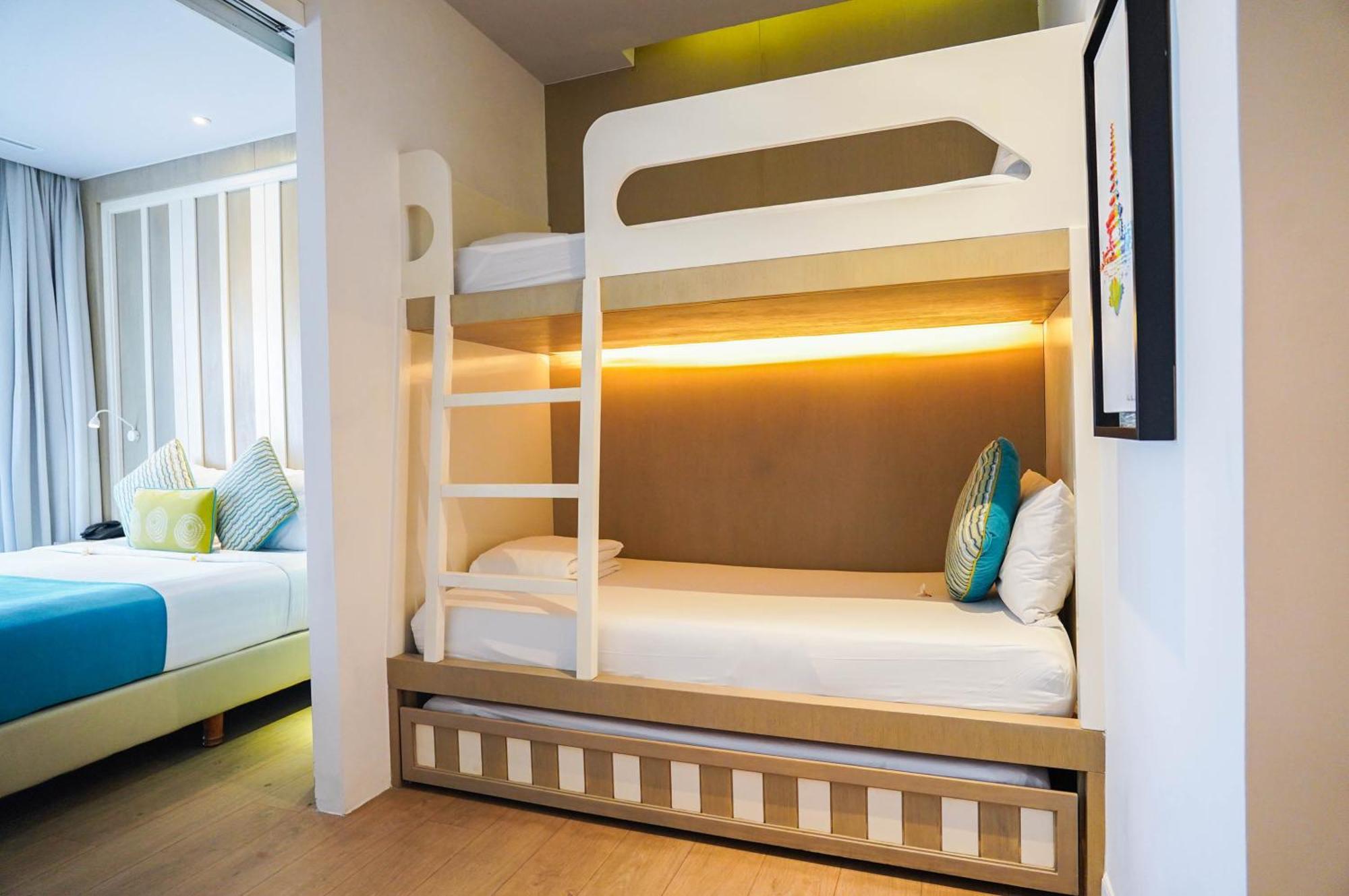 Grand Mirage Resort & Thalasso Bali นูซาดูอา ภายนอก รูปภาพ Bunk beds in a hotel room